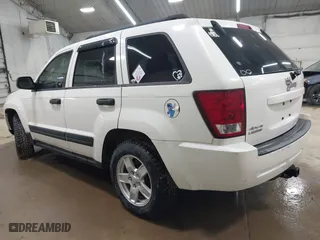 2006 Jeep Grand Cherokee Laredo with VIN 1J8GR48K06C163877, listed as a IAAI auction lot 41971240 with 250,544 mi miles. Bid and sale history available at carsss.com. Image 3.