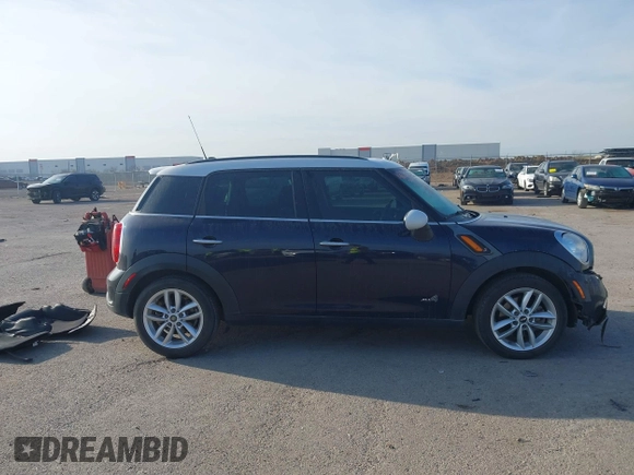 2013 MINI Countryman S ALL4 with VIN WMWZC5C58DWP33707, listed as a IAAI auction lot 41835234 with 98,441 mi miles and . Bid and sale history available at DreamBid. Image 13.