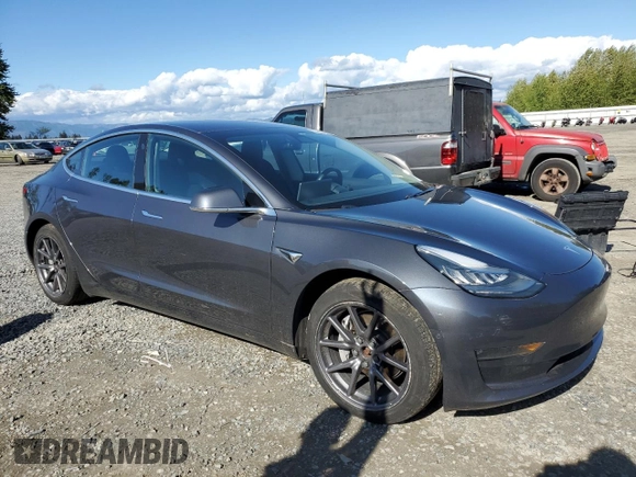 2018 Tesla Model 3 Long Range Battery z VIN 5YJ3E1EB1JF119368, wystawiony jako Copart lot #54059834 z przebiegiem 49 216 mil mil oraz Szkody całkowita. Historia ofert i sprzedaży dostępna na DreamBid. Obrazek 4.