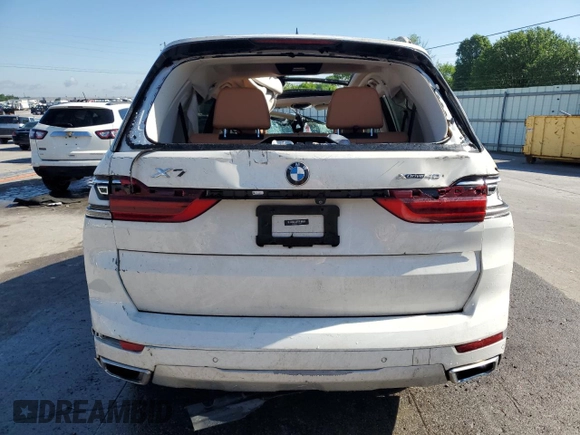 2020 BMW X7 xDrive40i z VIN 5UXCW2C08L9B92949, wystawiony jako Copart lot #55934825 z przebiegiem Nie podano mil oraz Szkoda całkowita • Salvage title. Historia ofert i sprzedaży dostępna na DreamBid. Obrazek 6.