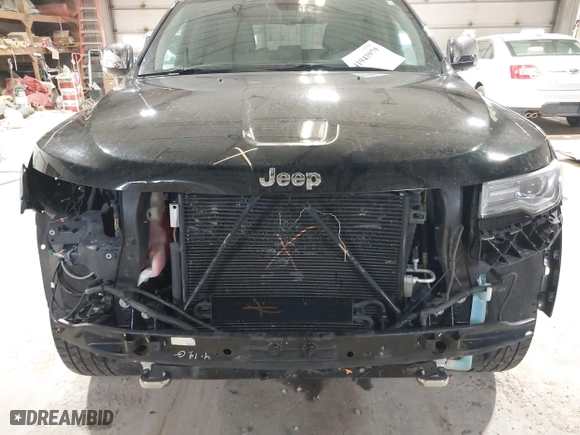 2014 Jeep Grand Cherokee Overland with VIN 1C4RJFCGXEC162109, listed as a IAAI auction lot 41943979 with 147,788 mi miles. Bid and sale history available at carsss.com. Image 13.