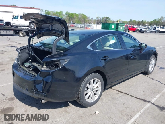 2016 Mazda Mazda6 i Sport with VIN JM1GJ1U54G1422560, listed as a IAAI auction lot 41935881 with 87,030 mi miles. Bid and sale history available at carsss.com. Image 4.