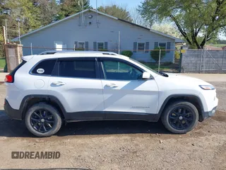 2015 Jeep Cherokee Latitude with VIN 1C4PJMCS0FW790017, listed as a IAAI auction lot 42097988 with 105,990 mi miles and . Bid and sale history available at DreamBid. Image 13.