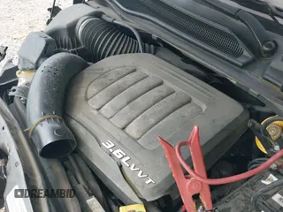 2014 Dodge Grand Caravan SE with VIN 2C4RDGBG1ER470095, listed as a IAAI auction lot 42996977 with 107,977 mi miles and . Bid and sale history available at DreamBid. Image 21.