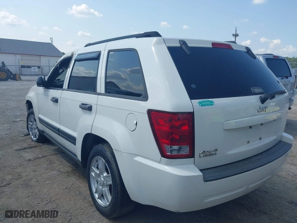 2006 Jeep Grand Cherokee Laredo with VIN 1J4GR48K36C334509, listed as a IAAI auction lot 40343794 with 202,746 mi miles. Bid and sale history available at carsss.com. Image 3.