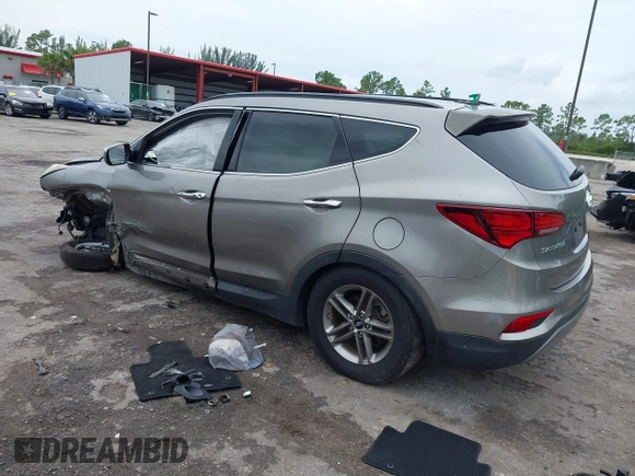 2017 Hyundai Santa Fe 2.4L with VIN 5NMZU3LB2HH014844, listed as a IAAI auction lot 42657624 with 93,533 mi miles and . Bid and sale history available at DreamBid. Image 3.