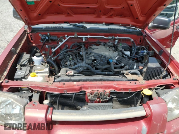 2003 Nissan Frontier XE with VIN 1N6ED26YX3C460026, listed as a Copart auction lot 59818595 with 140,306 mi miles and Clean title. Bid and sale history available at DreamBid. Image 11.