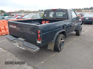 1995 Nissan Frontier SE with VIN 1N6HD16Y9SC458872, listed as a IAAI auction lot 41809314 with 184,016 mi miles and . Bid and sale history available at DreamBid. Image 4.