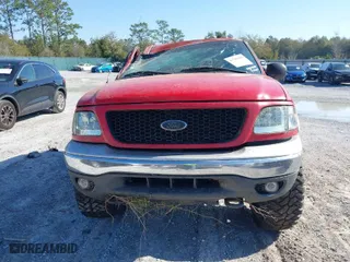 2000 Ford F-150 XL with VIN 1FTRX18L1YNC06272, listed as a IAAI auction lot 41780486 with 295,611 mi miles. Bid and sale history available at carsss.com. Image 13.