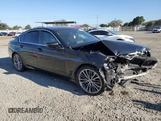 2020 BMW 5 Series 530e with VIN WBAJA9C05LCD74527, listed as a Copart auction lot 47013875 with Not Provided miles and Salvage Title. Bid and sale history available at DreamBid. Image 4.