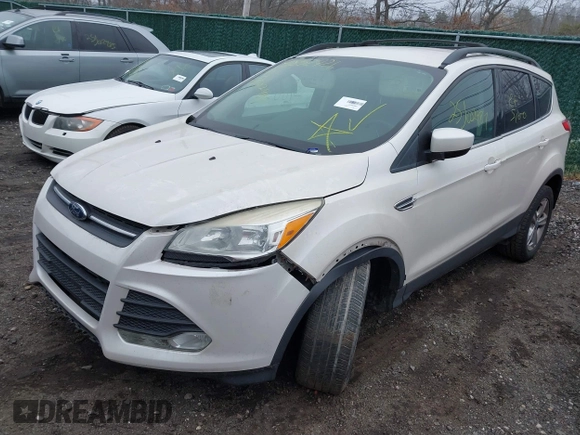2013 Ford Escape SE with VIN 1FMCU9G96DUC32901, listed as a IAAI auction lot 41852421 with 999,999 mi miles. Bid and sale history available at carsss.com. Image 2.