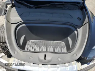 2022 Tesla Model Y Performance z VIN 7SAYGDEF2NF443037, wystawiony jako Copart lot #56870145 z przebiegiem 51 897 mil mil oraz Szkoda całkowita • Salvage title. Historia ofert i sprzedaży dostępna na DreamBid. Obrazek 12.