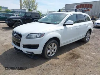 2015 Audi Q7 Premium Plus with VIN WA1LGAFE8FD017092, listed as a IAAI auction lot 42073593 with 105,593 mi miles and . Bid and sale history available at DreamBid. Image 2.