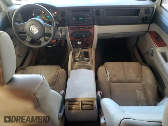 2007 Jeep Commander Limited with VIN 1J8HG582X7C553502, listed as a Copart auction lot 89201285 with 184,233 mi miles and Salvage title. Bid and sale history available at DreamBid. Image 8.