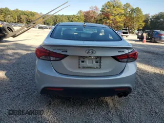 2014 Hyundai Elantra Coupe with VIN KMHDH6AH4EU026680, listed as a Copart auction lot 77350814 with 104,828 mi miles and Salvage Title. Bid and sale history available at carsss.com. Image 6.