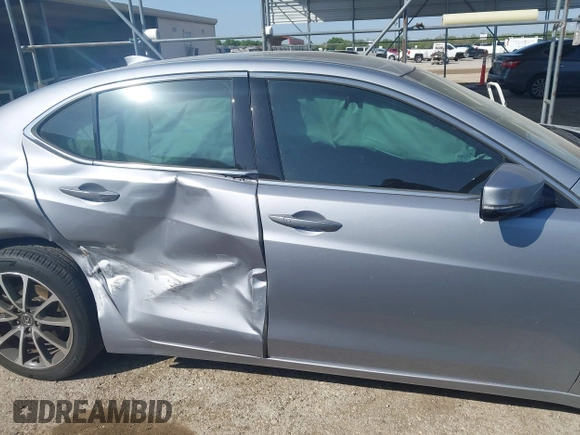 2015 Acura TLX Technology z VIN 19UUB2F50FA005004, wystawiony jako IAAI lot #42190767 z przebiegiem 48 195 mil mil oraz . Historia ofert i sprzedaży dostępna na DreamBid. Obrazek 13.