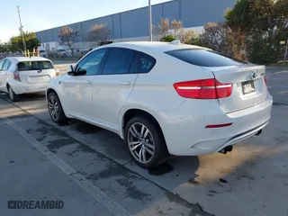 2012 BMW X6 M with VIN 5YMGZ0C59CLK14913, listed as a IAAI auction lot 41635362 with 137,979 mi miles. Bid and sale history available at carsss.com. Image 3.