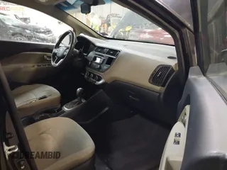 2014 Kia Rio LX with VIN KNADM4A31E6404206, listed as a IAAI auction lot 41543090 with 70,563 mi miles and . Bid and sale history available at DreamBid. Image 5.