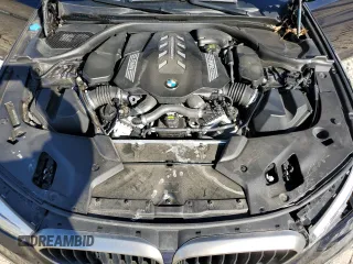 2020 BMW 5 Series M550i xDrive with VIN WBAJS7C0XLCE44248, listed as a Copart auction lot 48660045 with 73,949 mi miles and Salvage title. Bid and sale history available at DreamBid. Image 12.
