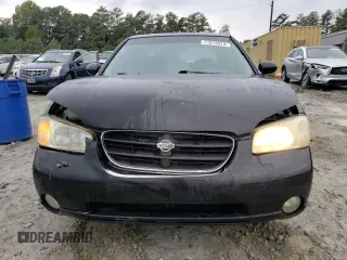 2000 Nissan Maxima GXE z VIN JN1CA31A8YT210913, wystawiony jako Copart lot #56272455 z przebiegiem 281 645 mil mil oraz Nie do naprawy • Non repairable. Historia ofert i sprzedaży dostępna na DreamBid. Obrazek 5.