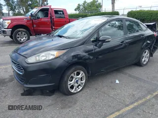 2014 Ford Fiesta SE z VIN 3FADP4BJ0EM216922, wystawiony jako IAAI lot #42255776 z przebiegiem 87 371 mil mil oraz . Historia ofert i sprzedaży dostępna na DreamBid. Obrazek 18.