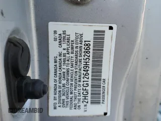 2009 Honda Civic Cpe LX with VIN 2HGFG12649H528681, listed as a Copart auction lot 53290745 with 156,798 mi miles and Salvage Title. Bid and sale history available at carsss.com. Image 13.