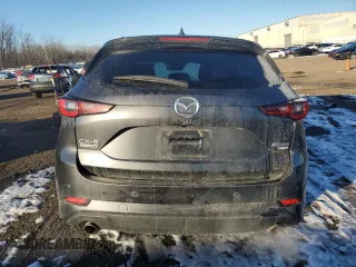 2023 Mazda CX-5 Signature with VIN JM3KFBXY8P0258573, listed as a Copart auction lot 42615075 with 18,916 mi miles and Salvage Title. Bid and sale history available at carsss.com. Image 6.
