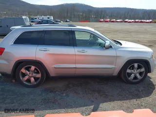2012 Jeep Grand Cherokee Overland with VIN 1C4RJFCGXCC292257, listed as a IAAI auction lot 41844192 with 182,522 mi miles. Bid and sale history available at carsss.com. Image 13.