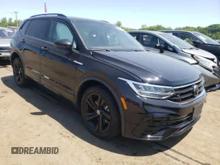 2023 Volkswagen Tiguan SE R-Line Black with VIN 3VV8B7AX2PM121851, listed as a Copart auction lot 59206135 with 23,723 mi miles and Salvage title. Bid and sale history available at DreamBid. Image 4.
