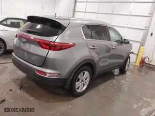 2017 Kia Sportage LX with VIN KNDPMCAC9H7260493, listed as a IAAI auction lot 41855393 with 130,860 mi miles. Bid and sale history available at carsss.com. Image 4.