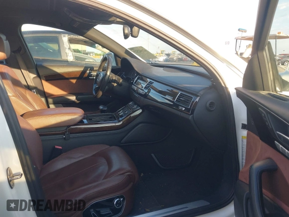 2013 Audi A8 3.0L z VIN WAURGAFD5DN009804, wystawiony jako IAAI lot #42642523 z przebiegiem 141 252 mil mil oraz . Historia ofert i sprzedaży dostępna na DreamBid. Obrazek 5.