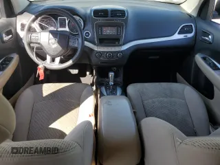 2012 Dodge Journey SXT z VIN 3C4PDDBG0CT293331, wystawiony jako Copart lot #62602995 z przebiegiem 185 605 mil mil oraz Szkoda całkowita • Salvage title. Historia ofert i sprzedaży dostępna na DreamBid. Obrazek 8.