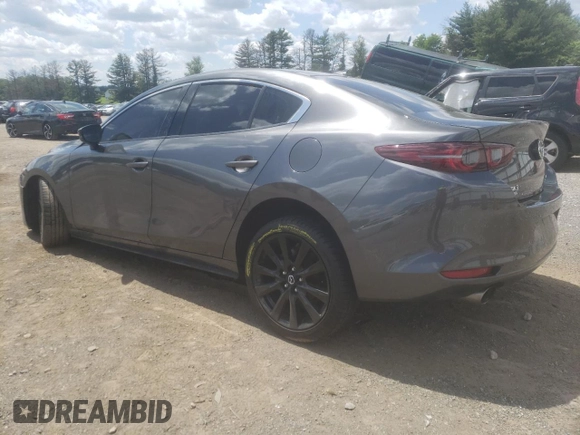2021 Mazda 3 2.5 Turbo with VIN JM1BPBAY1M1316110, listed as a Copart auction lot 56730204 with 44,168 mi miles and Salvage Title. Bid and sale history available at DreamBid. Image 2.