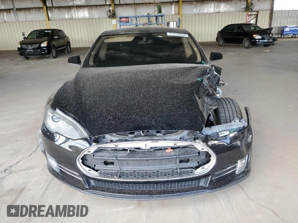 2014 Tesla Model S 60 z VIN 5YJSA1H11EFP36480, wystawiony jako Copart lot #71210254 z przebiegiem 121 014 mil mil oraz Szkoda całkowita • Salvage title. Historia ofert i sprzedaży dostępna na DreamBid. Obrazek 5.