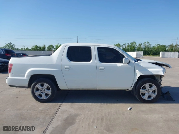 2010 Honda Ridgeline RTL with VIN 5FPYK1F54AB011339, listed as a IAAI auction lot 41983918 with 201,124 mi miles. Bid and sale history available at carsss.com. Image 13.