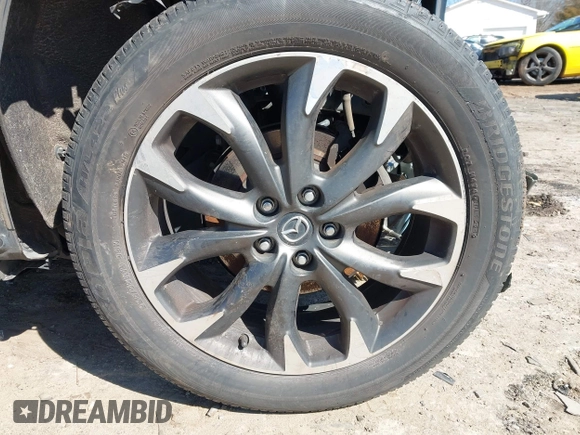2016 Mazda CX-5 Grand Touring with VIN JM3KE2DY2G0715272, listed as a IAAI auction lot 41590492 with 134,176 mi miles. Bid and sale history available at carsss.com. Image 12.