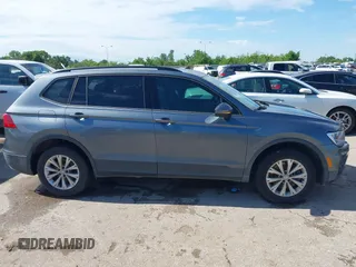 2019 Volkswagen Tiguan S with VIN 3VV1B7AX1KM085354, listed as a IAAI auction lot 42229851 with 85,169 mi miles and . Bid and sale history available at DreamBid. Image 13.