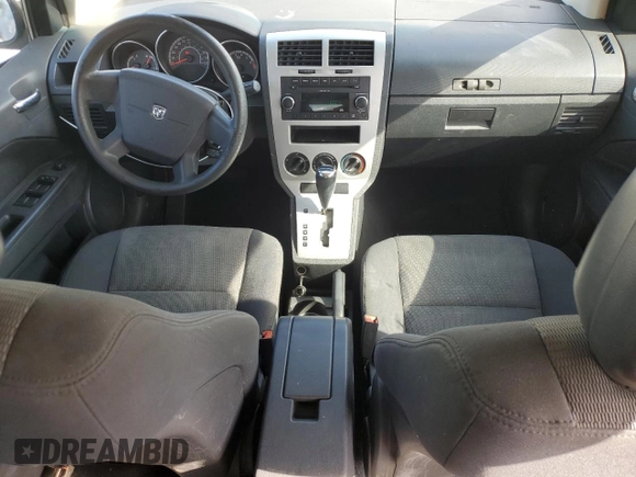 2009 Dodge Caliber SXT with VIN 1B3HB48AX9D157186, listed as a Copart auction lot 52892065 with 218,024 mi miles and Salvage Title. Bid and sale history available at carsss.com. Image 8.