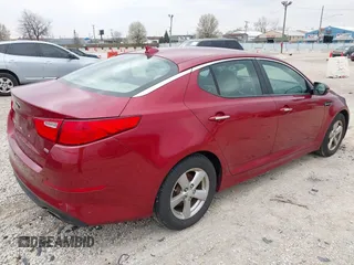2015 Kia Optima LX with VIN 5XXGM4A72FG357449, listed as a IAAI auction lot 42079075 with 136,042 mi miles. Bid and sale history available at carsss.com. Image 4.