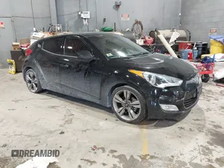 2012 Hyundai Veloster w/Black Int with VIN KMHTC6AD7CU080950, listed as a IAAI auction lot 41606241 with 86,843 mi miles and . Bid and sale history available at DreamBid. Image 1.