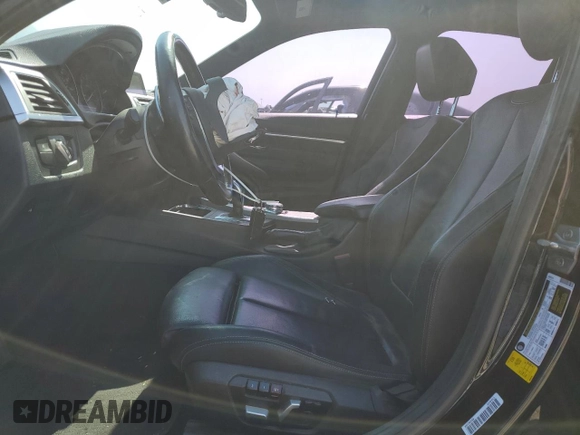2018 BMW 3 Series 330i with VIN WBA8B9G52JNU98674, listed as a Copart auction lot 59783985 with 77,712 mi miles and Clean title. Bid and sale history available at DreamBid. Image 7.