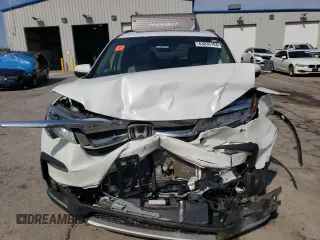 2022 Honda Pilot Touring 7-Passenger with VIN 5FNYF6H64NB054732, listed as a Copart auction lot 63036104 with 33,252 mi miles and Salvage Title. Bid and sale history available at carsss.com. Image 5.