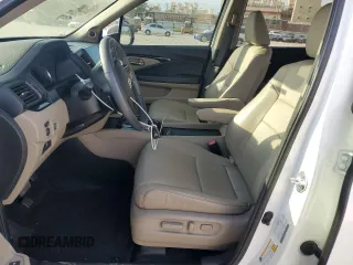 2022 Honda Pilot Touring 7-Passenger with VIN 5FNYF5H65NB011768, listed as a Copart auction lot 74134503 with 27,517 mi miles and Salvage title. Bid and sale history available at DreamBid. Image 7.
