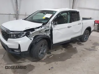 2022 Honda Ridgeline RTL-E z VIN 5FPYK3F76NB033832, wystawiony jako IAAI lot #41838047 z przebiegiem 16 497 mil mil oraz . Historia ofert i sprzedaży dostępna na DreamBid. Obrazek 18.