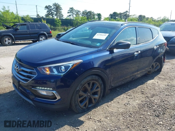 2018 Hyundai Santa Fe Ultimate with VIN 5XYZWDLA3JG571432, listed as a IAAI auction lot 42395245 with 69,330 mi miles and . Bid and sale history available at DreamBid. Image 2.