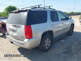 2013 GMC Yukon SLT with VIN 1GKS1CE09DR268602, listed as a IAAI auction lot 41992325 with 167,476 mi miles. Bid and sale history available at carsss.com. Image 4.