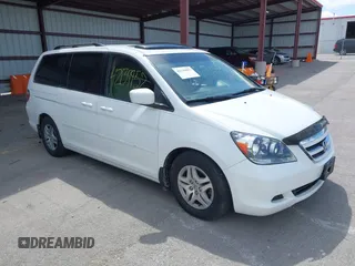 2007 Honda Odyssey EX-L with VIN 5FNRL38787B144585, listed as a IAAI auction lot 42139957 with 211,412 mi miles and . Bid and sale history available at DreamBid. Image 1.