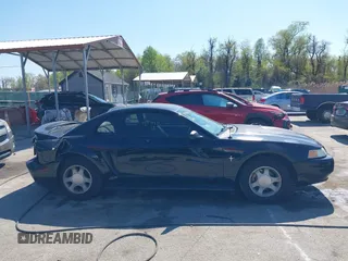 2000 Ford Mustang with VIN 1FAFP4042YF252802, listed as a IAAI auction lot 41994872 with 189,081 mi miles. Bid and sale history available at carsss.com. Image 13.