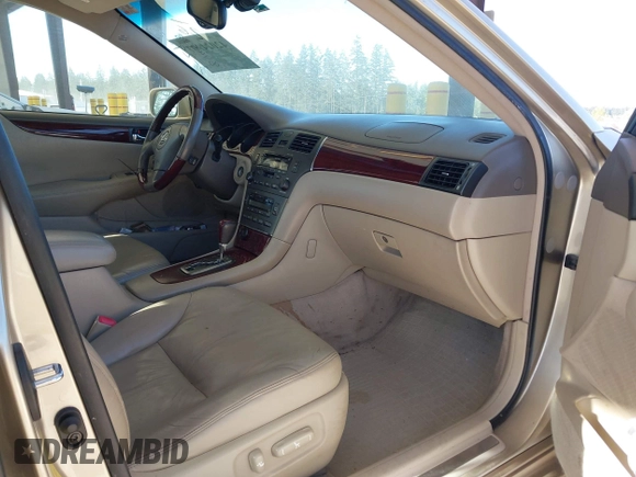 2004 Lexus ES 330 with VIN JTHBA30G340003869, listed as a IAAI auction lot 42024907 with 240,425 mi miles. Bid and sale history available at carsss.com. Image 5.