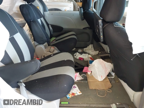 2012 Toyota Sienna with VIN 5TDKA3DC0CS012095, listed as a IAAI auction lot 41317071 with Not Provided miles and . Bid and sale history available at DreamBid. Image 8.